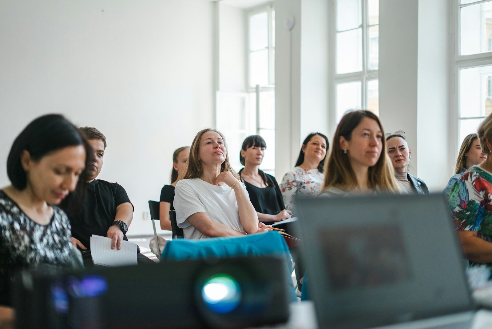 Adults participating in a bright workshop and learning session