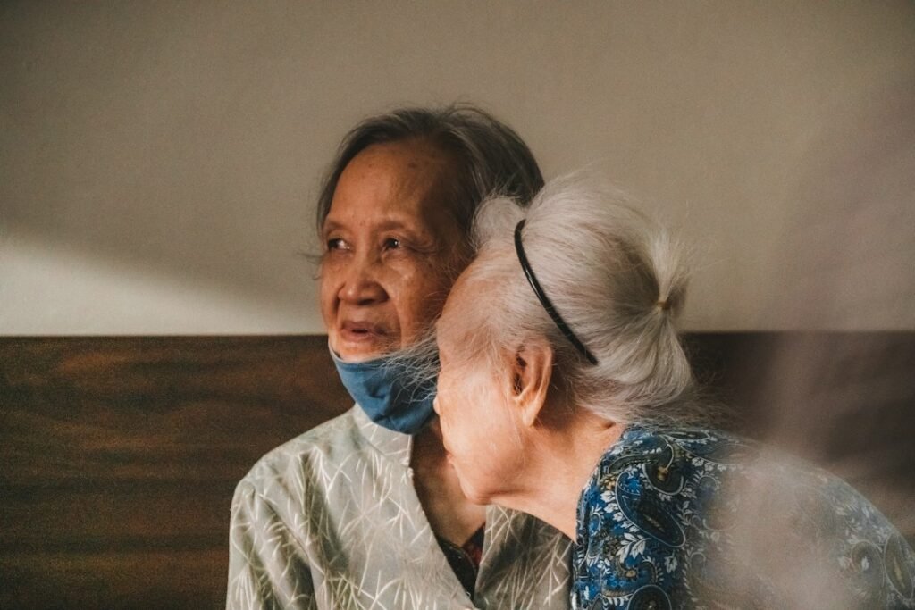 Two generations of an Asian family sharing a warm moment
